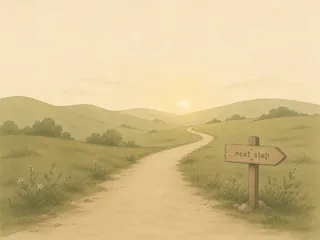 A path through soft green hills toward a signpost that reads next step.